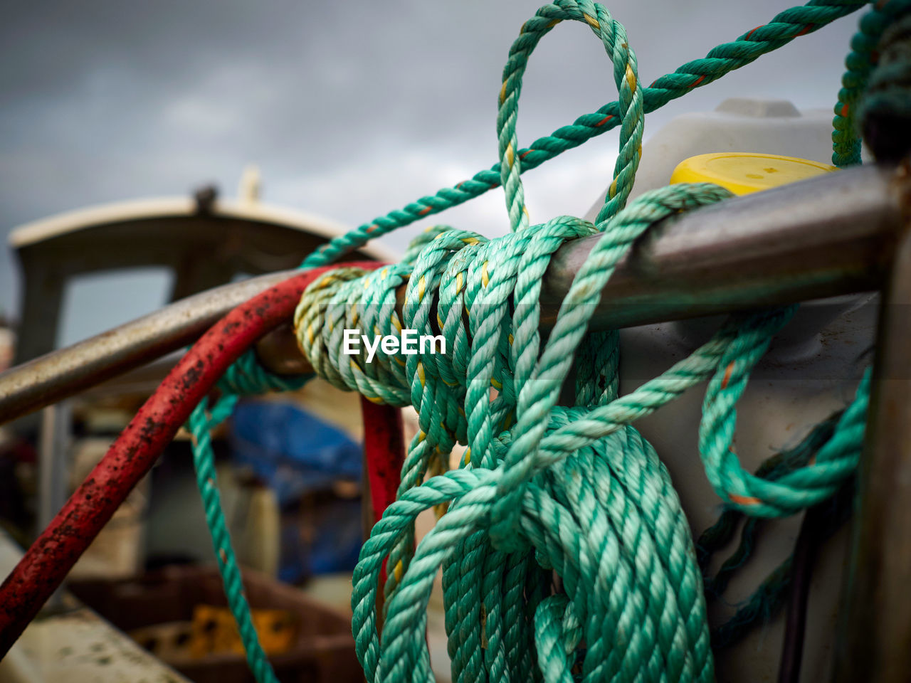 Close-up of rope tied to fishing boat