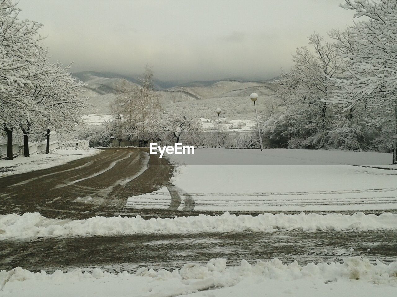 SCENIC VIEW OF SNOW COVERED LANDSCAPE