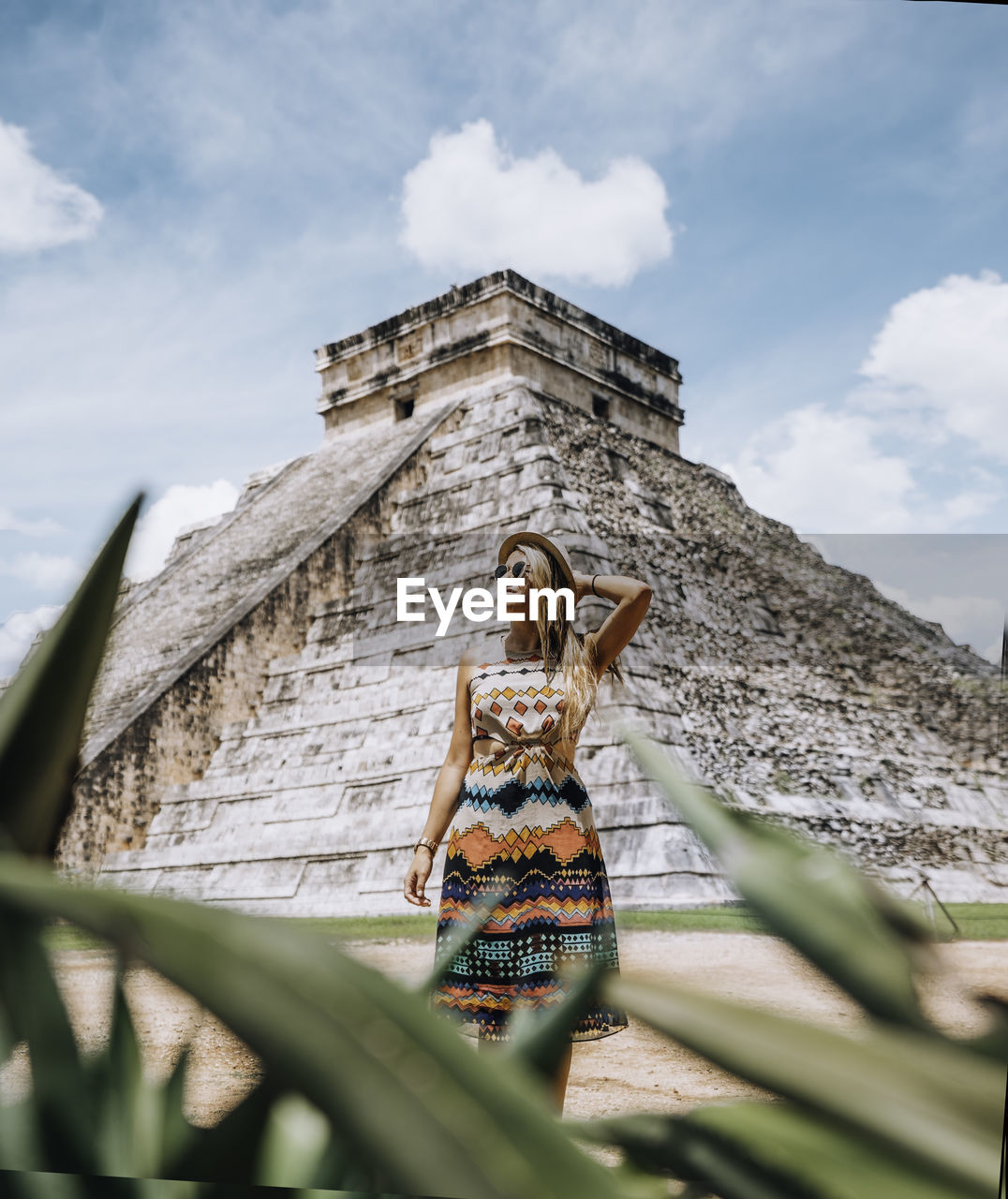 A young woman at the famous chichen itza.