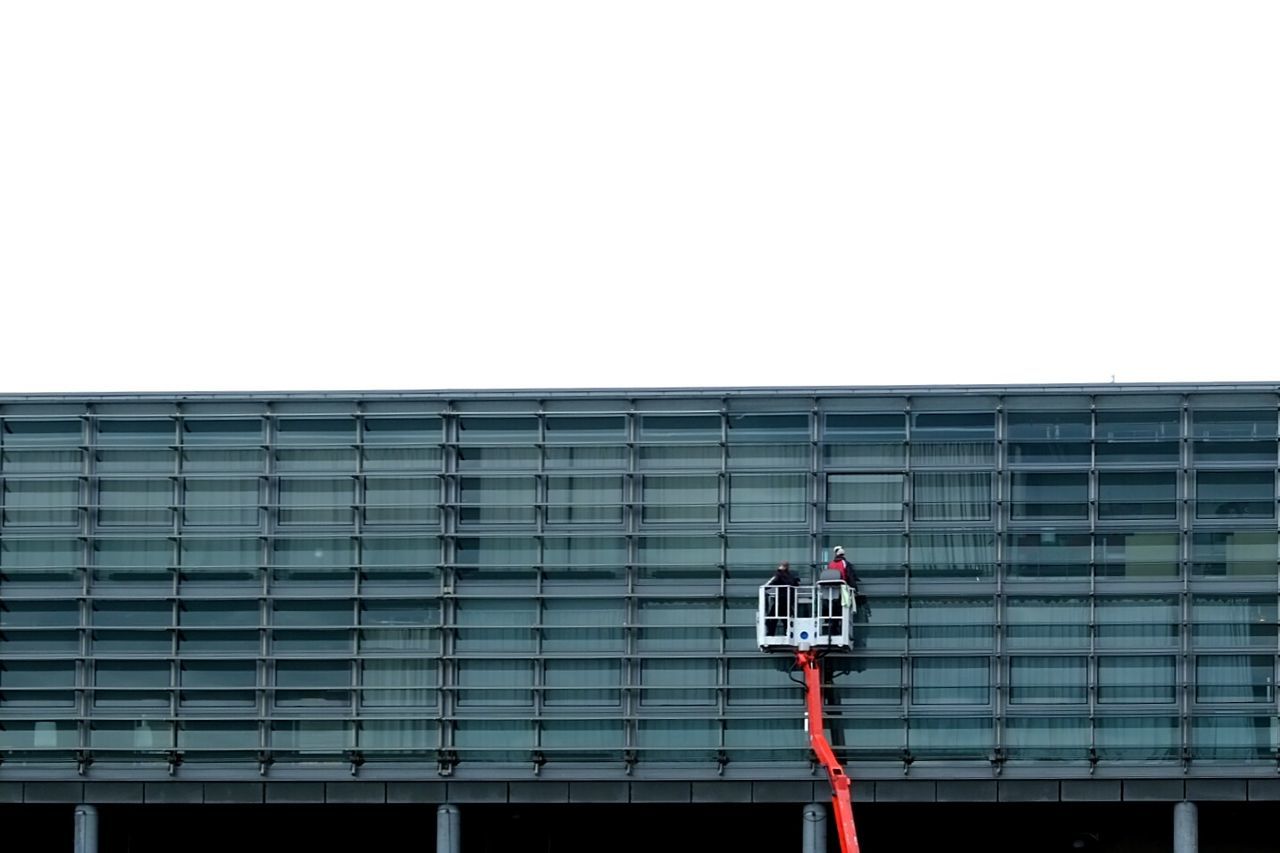 View of glass facade and industrial lift