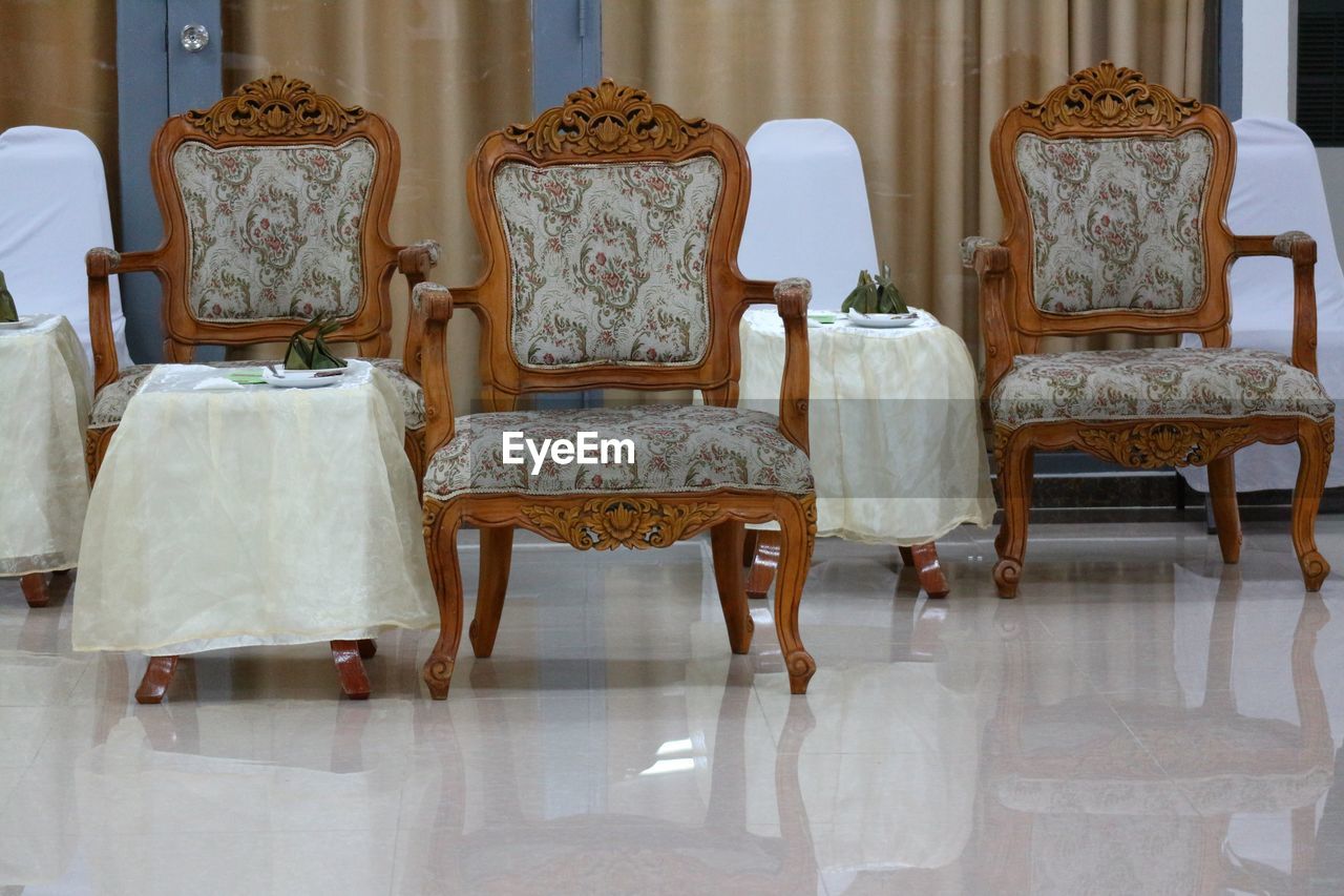 Empty chairs and tables at home