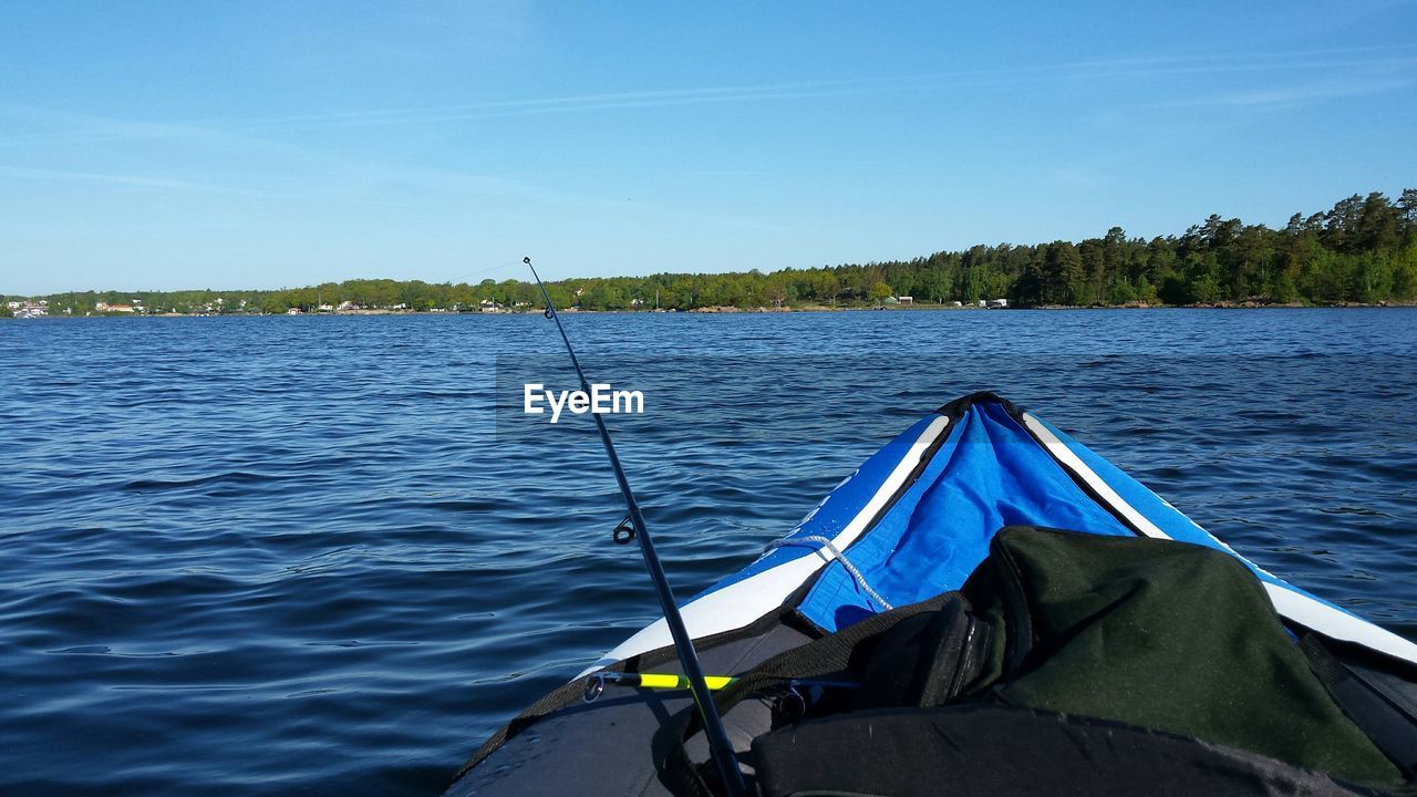 Close-up of a cropped boat in calm blue sea