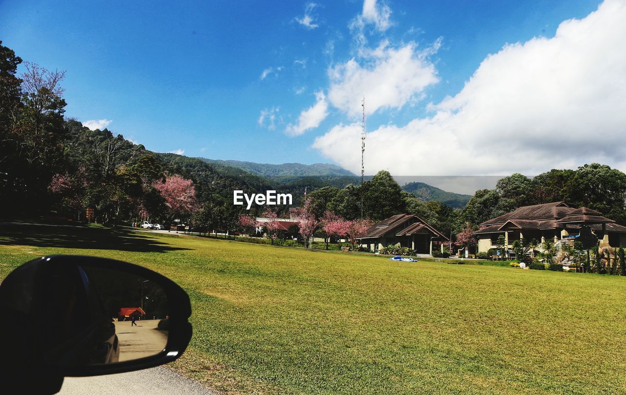 PANORAMIC VIEW OF LANDSCAPE AND MOUNTAINS AGAINST SKY