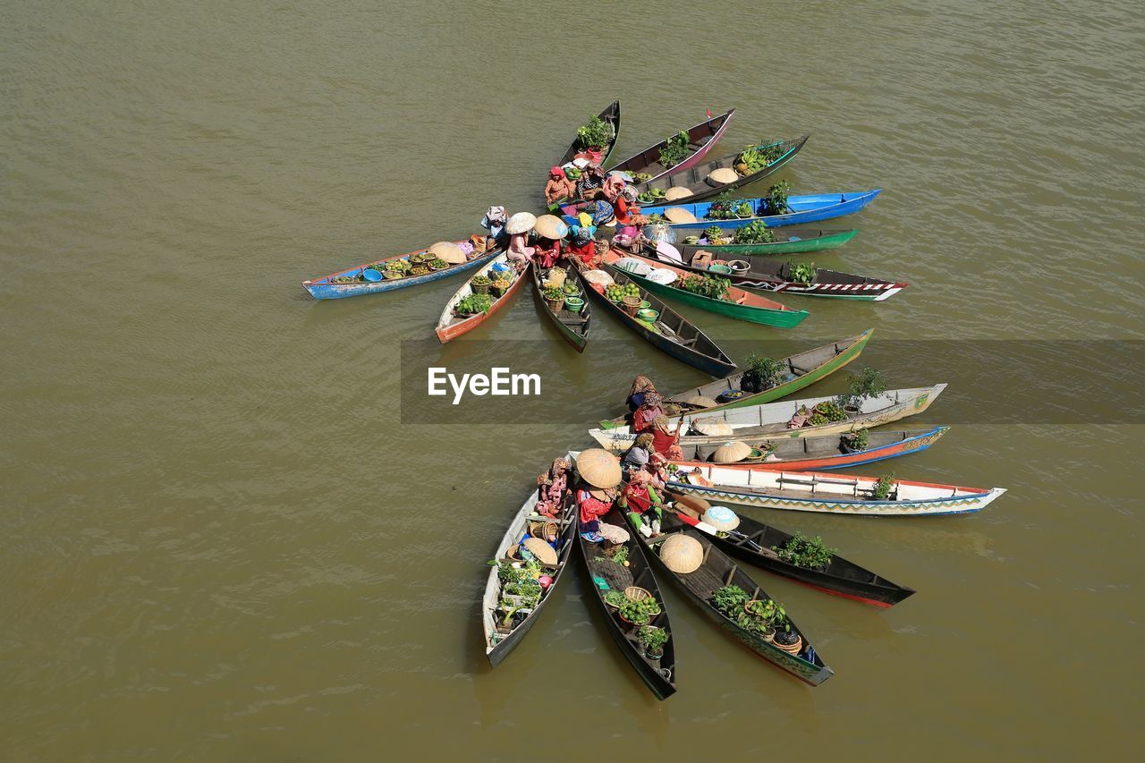 High angle view of people on boat in river