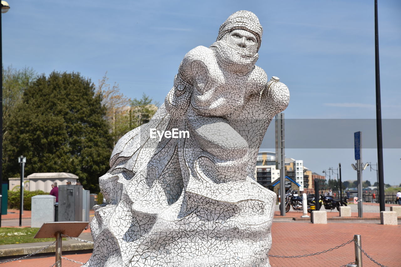 The scott memorial  statue, in cardiff bay, cardiff, wales, uk