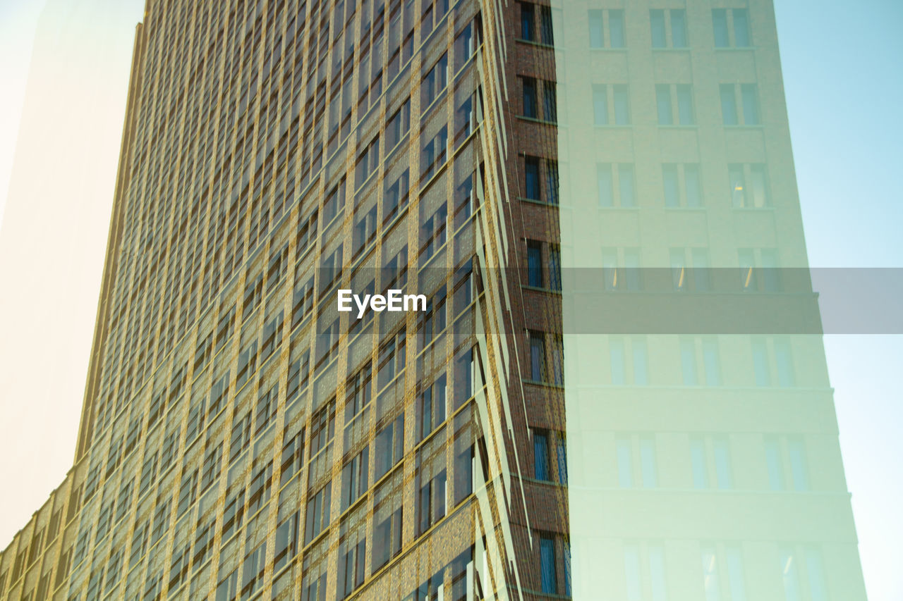 LOW ANGLE VIEW OF MODERN BUILDINGS