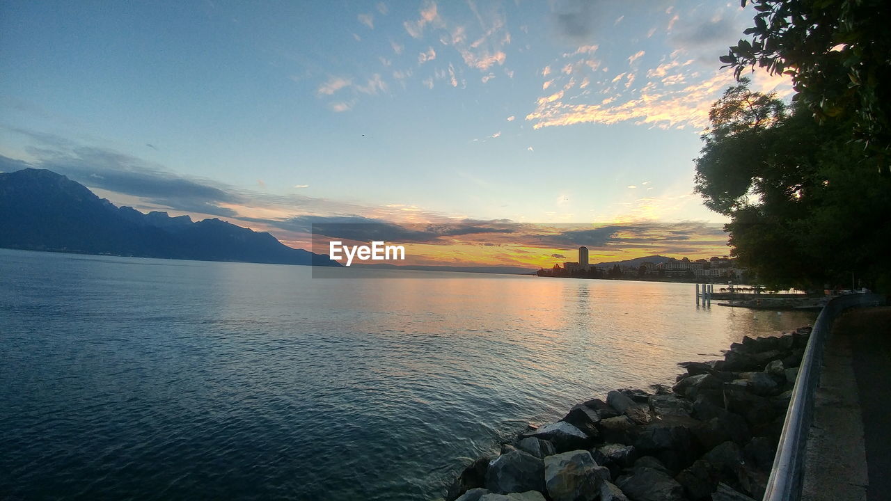 Scenic view of sea against sky during sunset