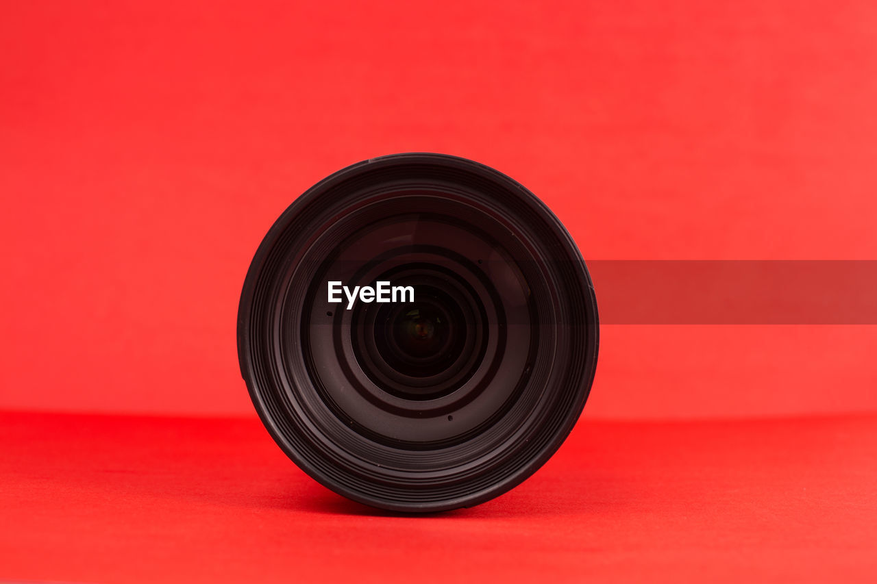 Close-up of camera lens on table