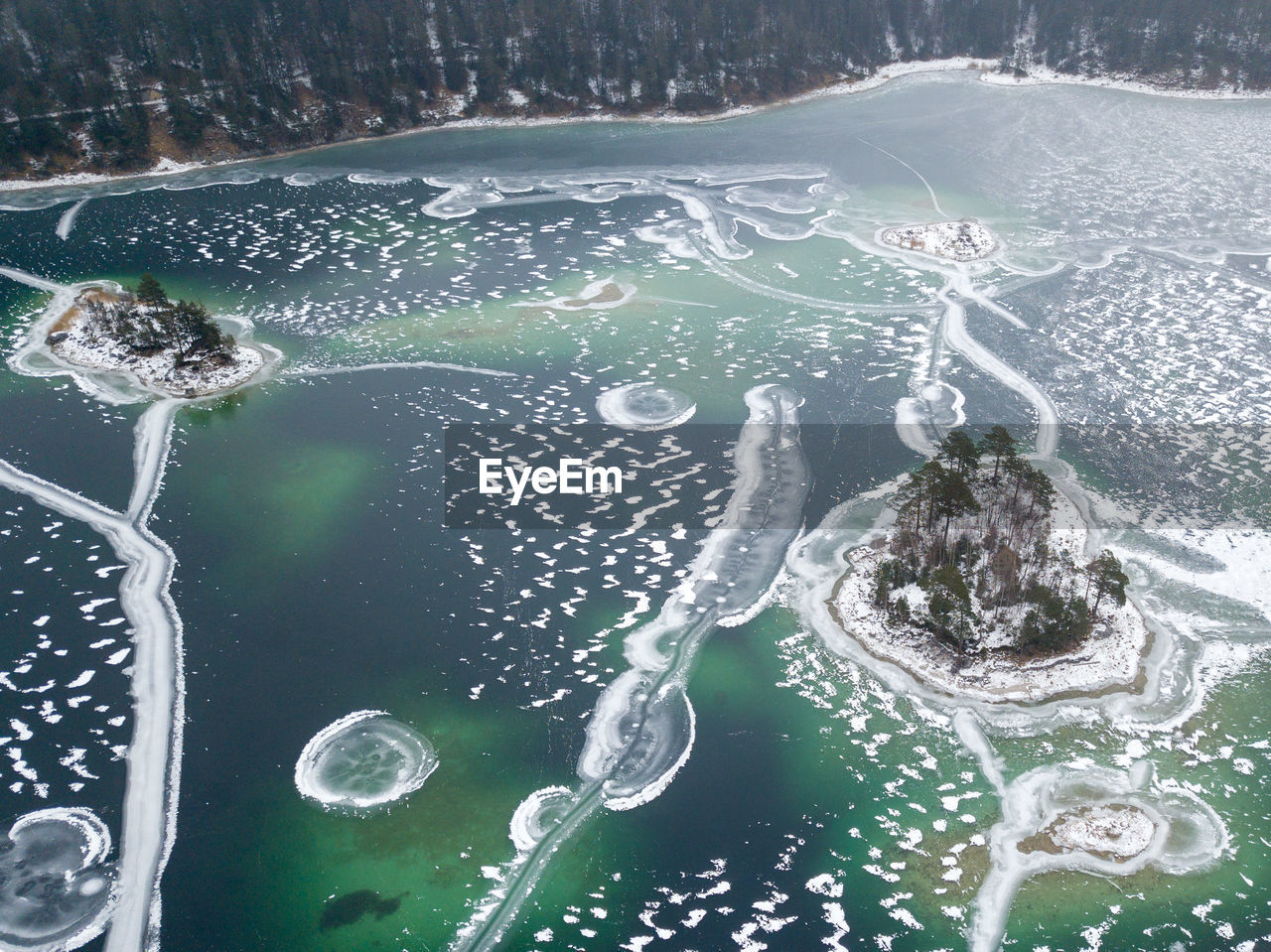 HIGH ANGLE VIEW OF FROZEN SEA