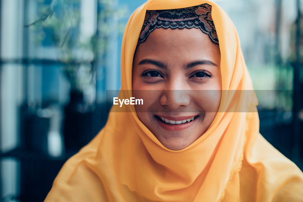 Portrait of smiling young woman