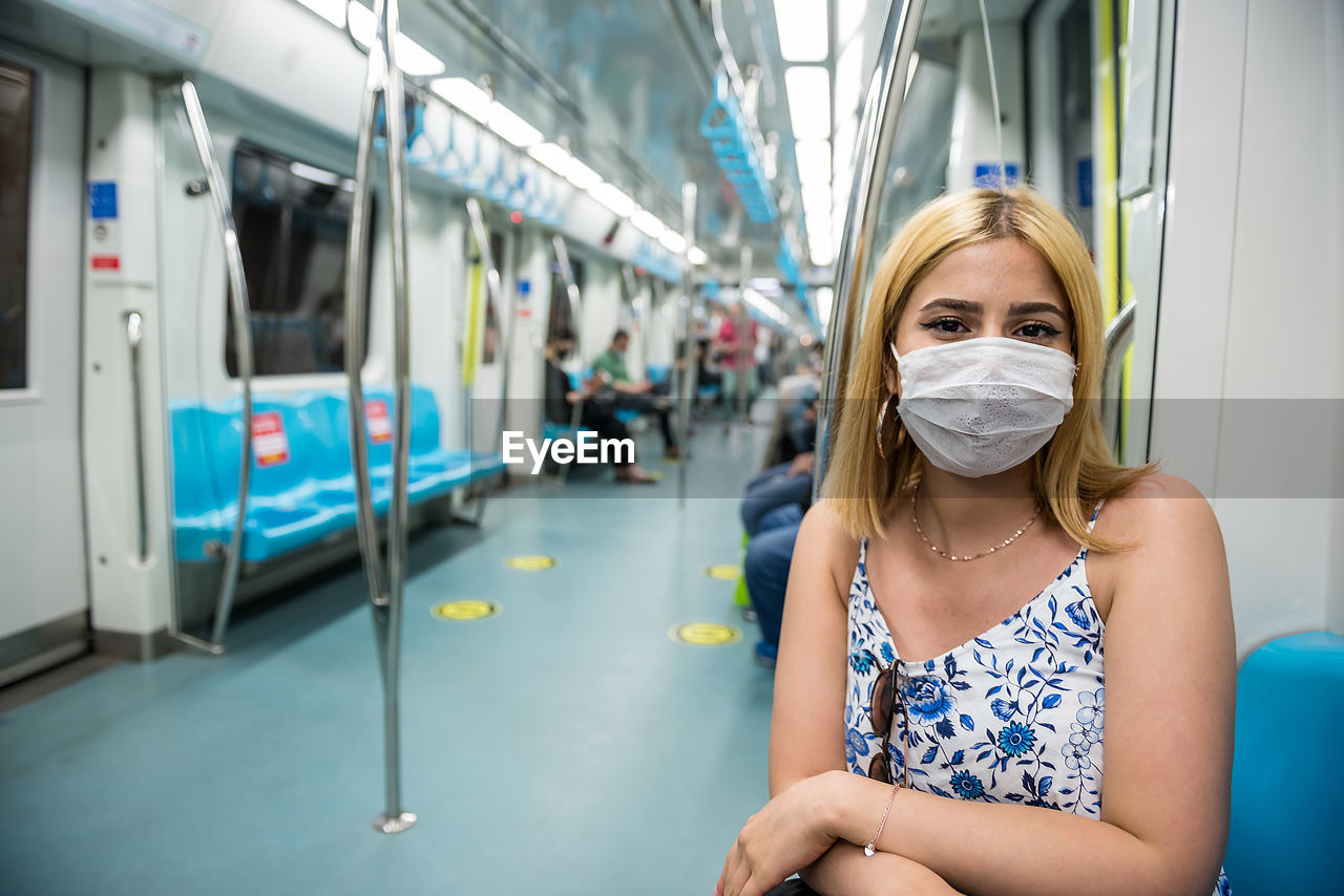 Portrait of woman in train