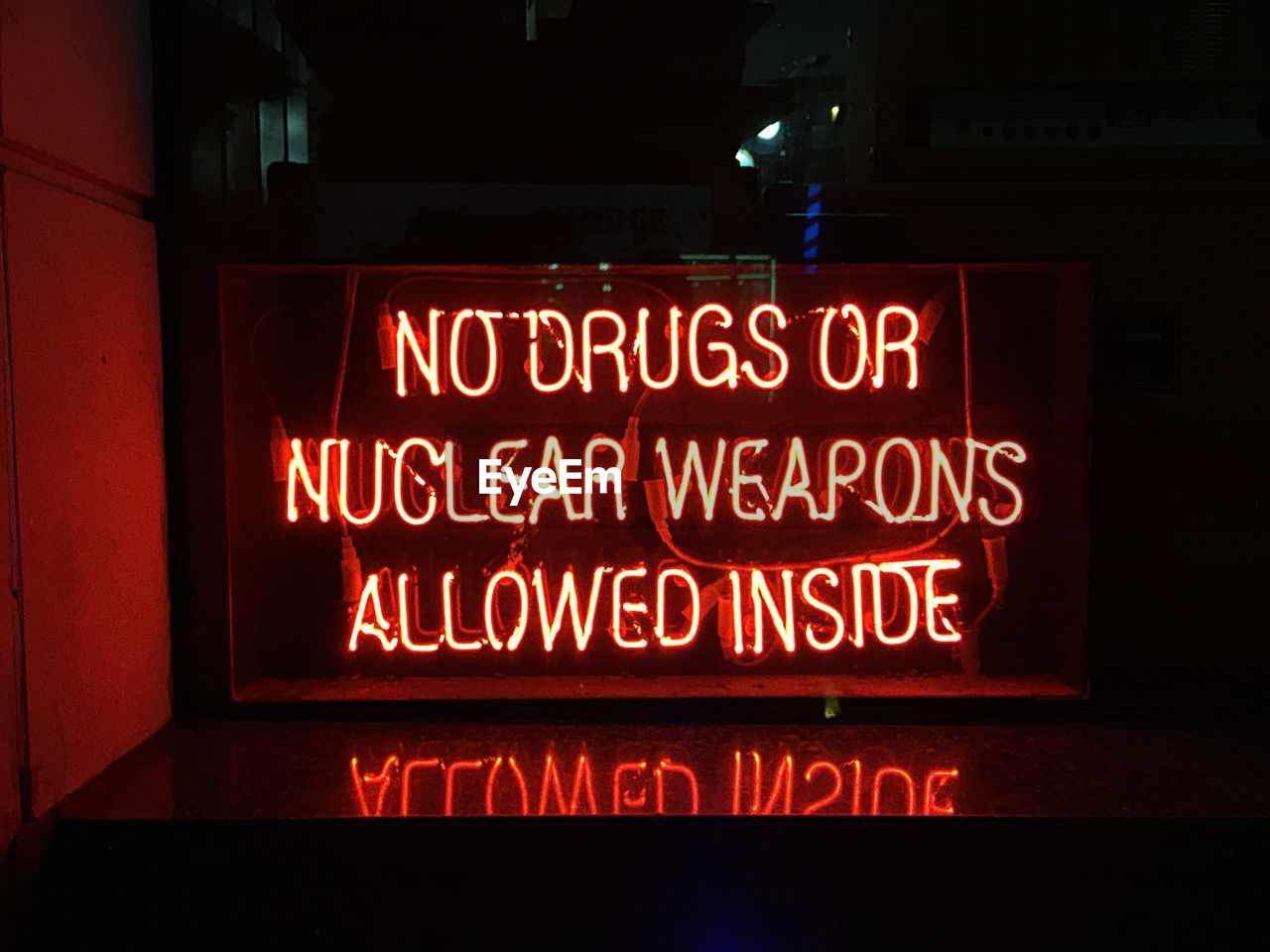 Illuminated text at night