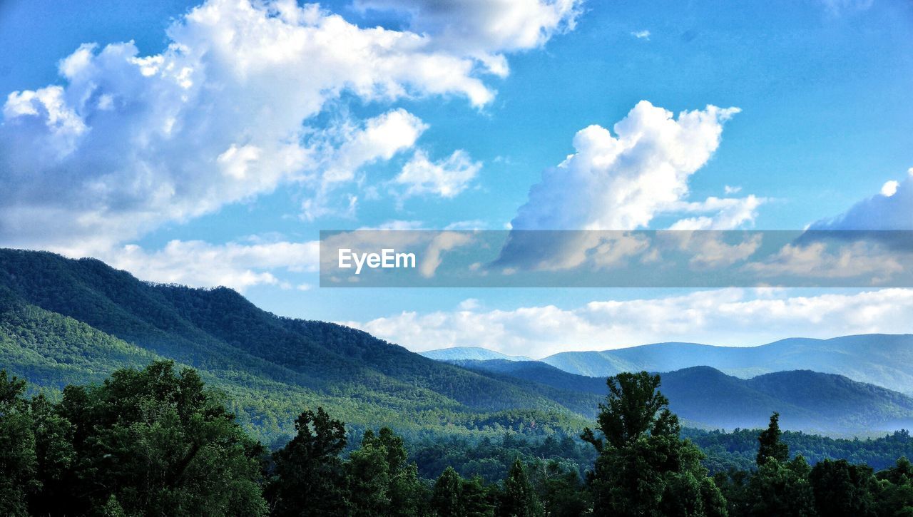 Scenic view of mountain range against sky