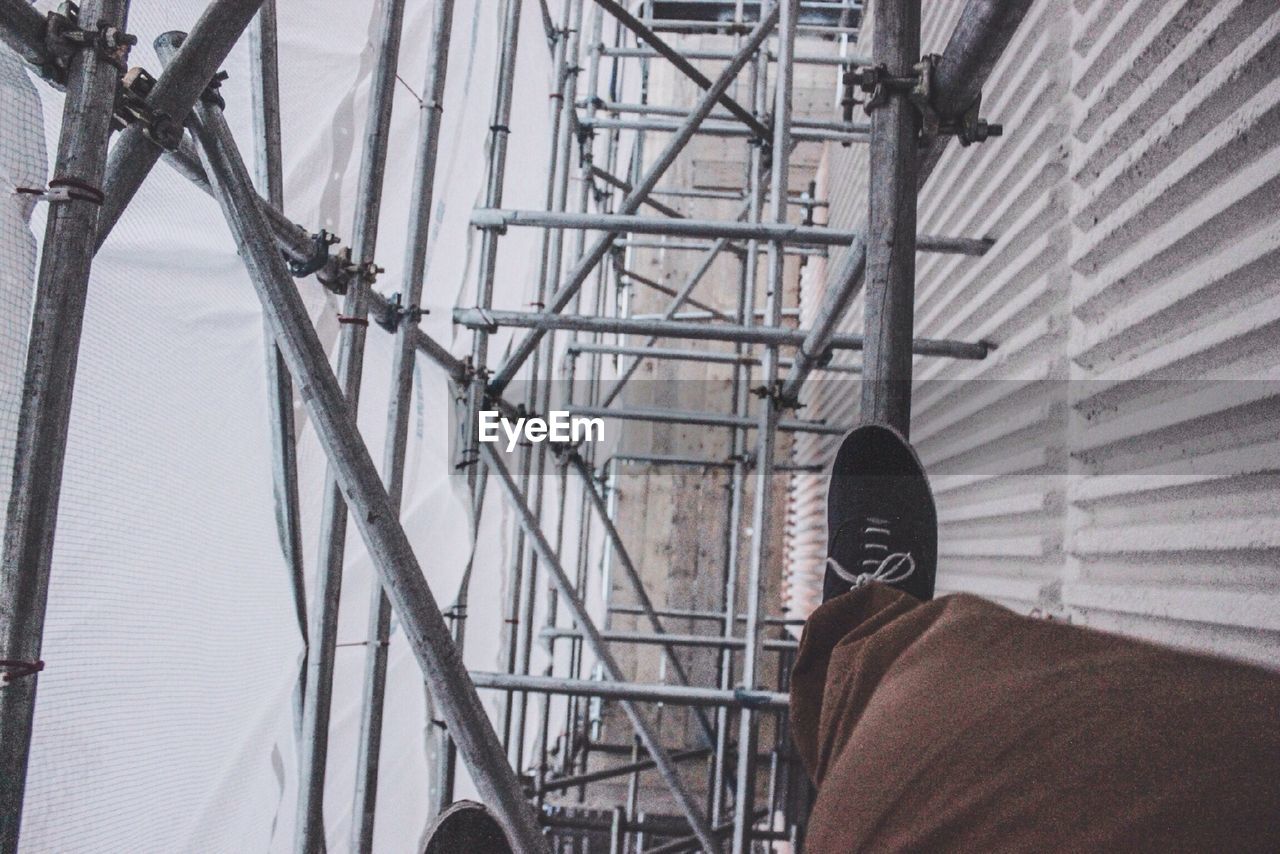 Person standing on scaffolding