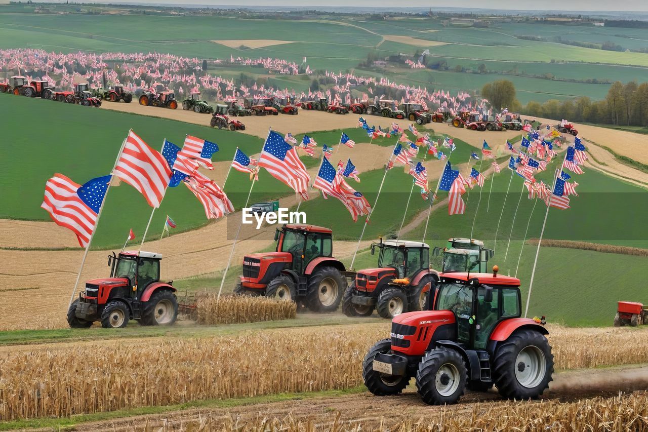 transportation, tractor, mode of transportation, agricultural machinery, agriculture, landscape, land, field, environment, agricultural equipment, farm, nature, vehicle, rural scene, flag, land vehicle, day, outdoors, plant, no people, crop