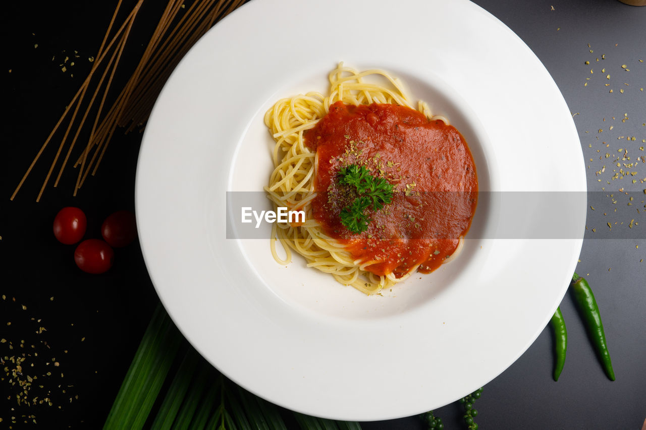 Directly above shot of pasta in plate on table