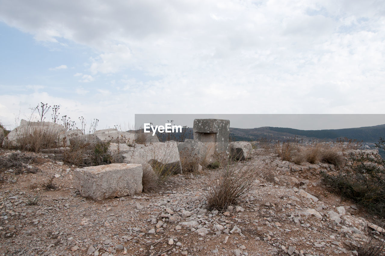 BUILT STRUCTURE ON LAND AGAINST SKY