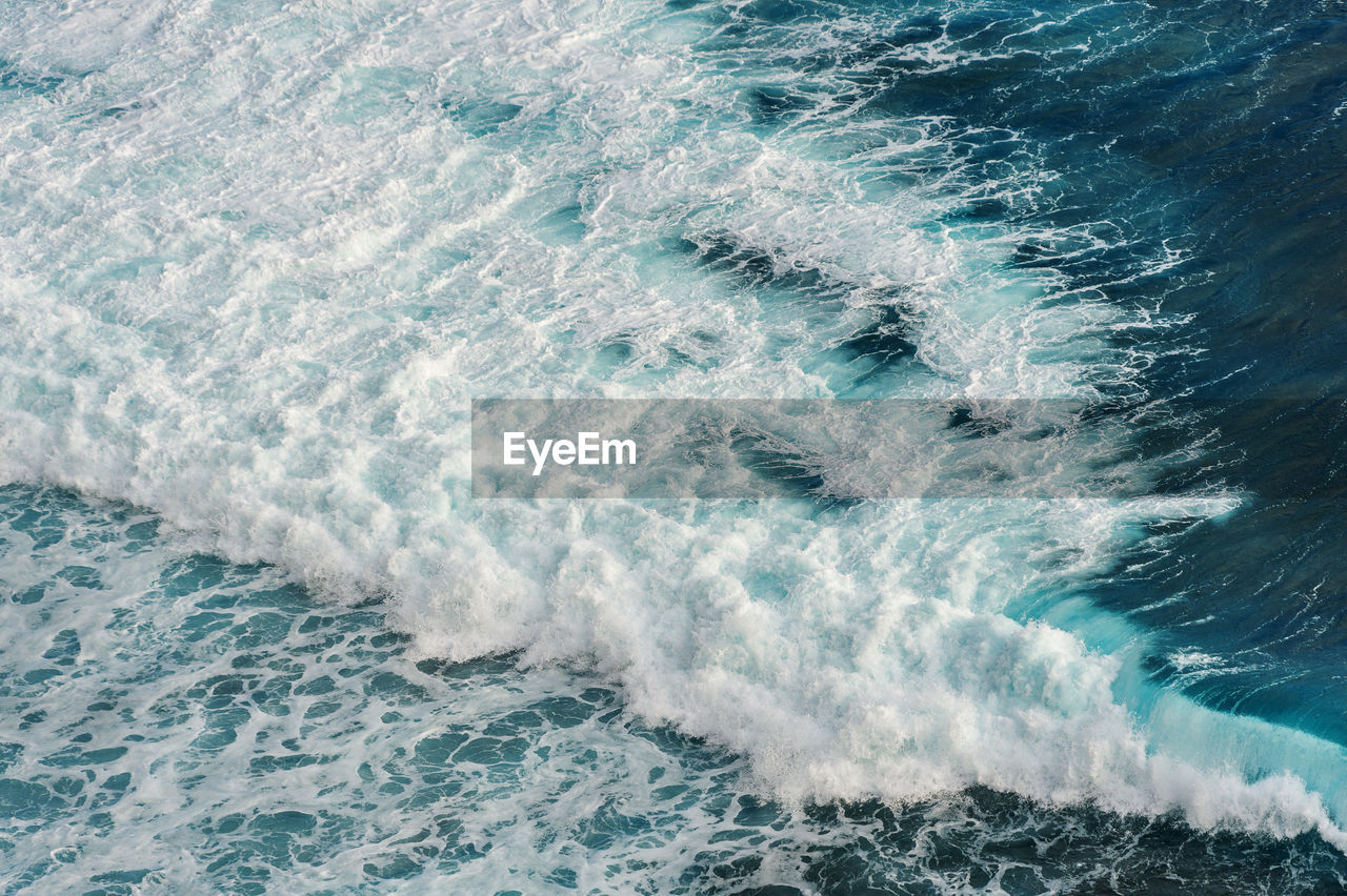 High angle view of waves at sea