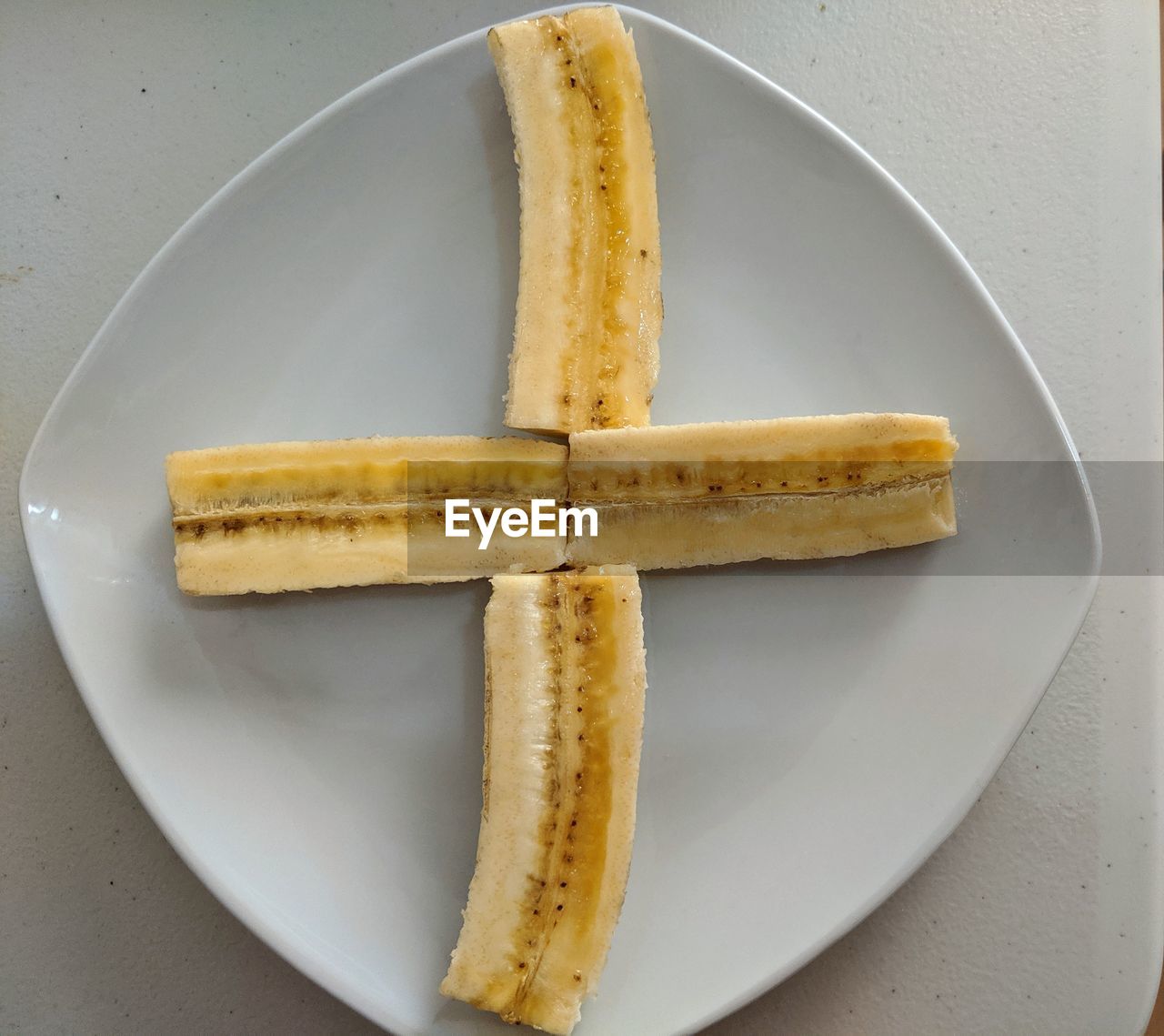 Directly above shot of bananas on plate