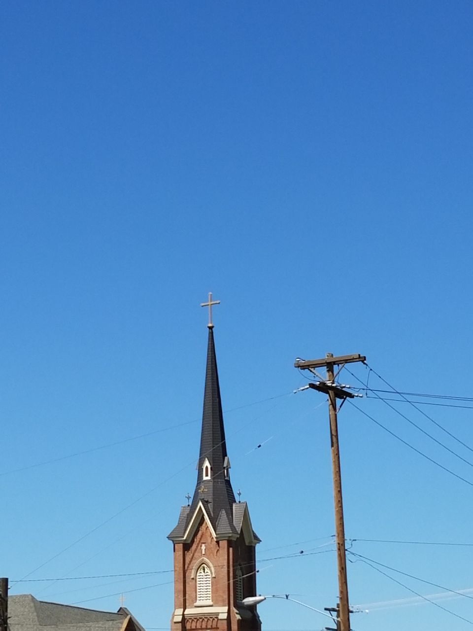 Low angle view of built structure against blue sky