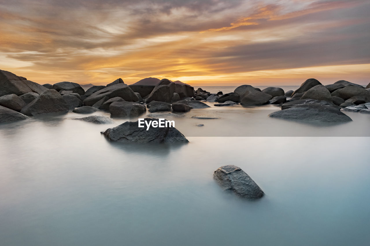 Scenic view of sea against sky during sunset