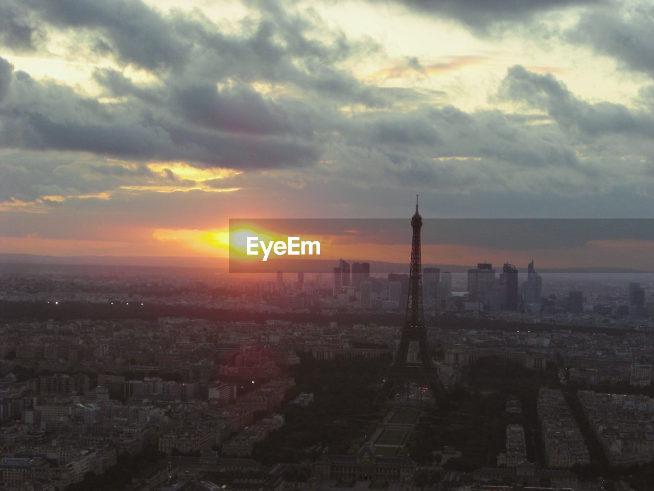 HIGH ANGLE SHOT OF CITYSCAPE AT SUNSET