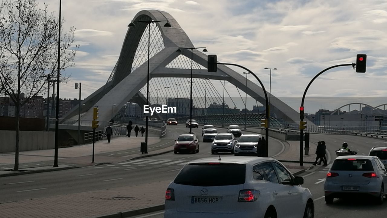 BRIDGE IN CITY AGAINST SKY