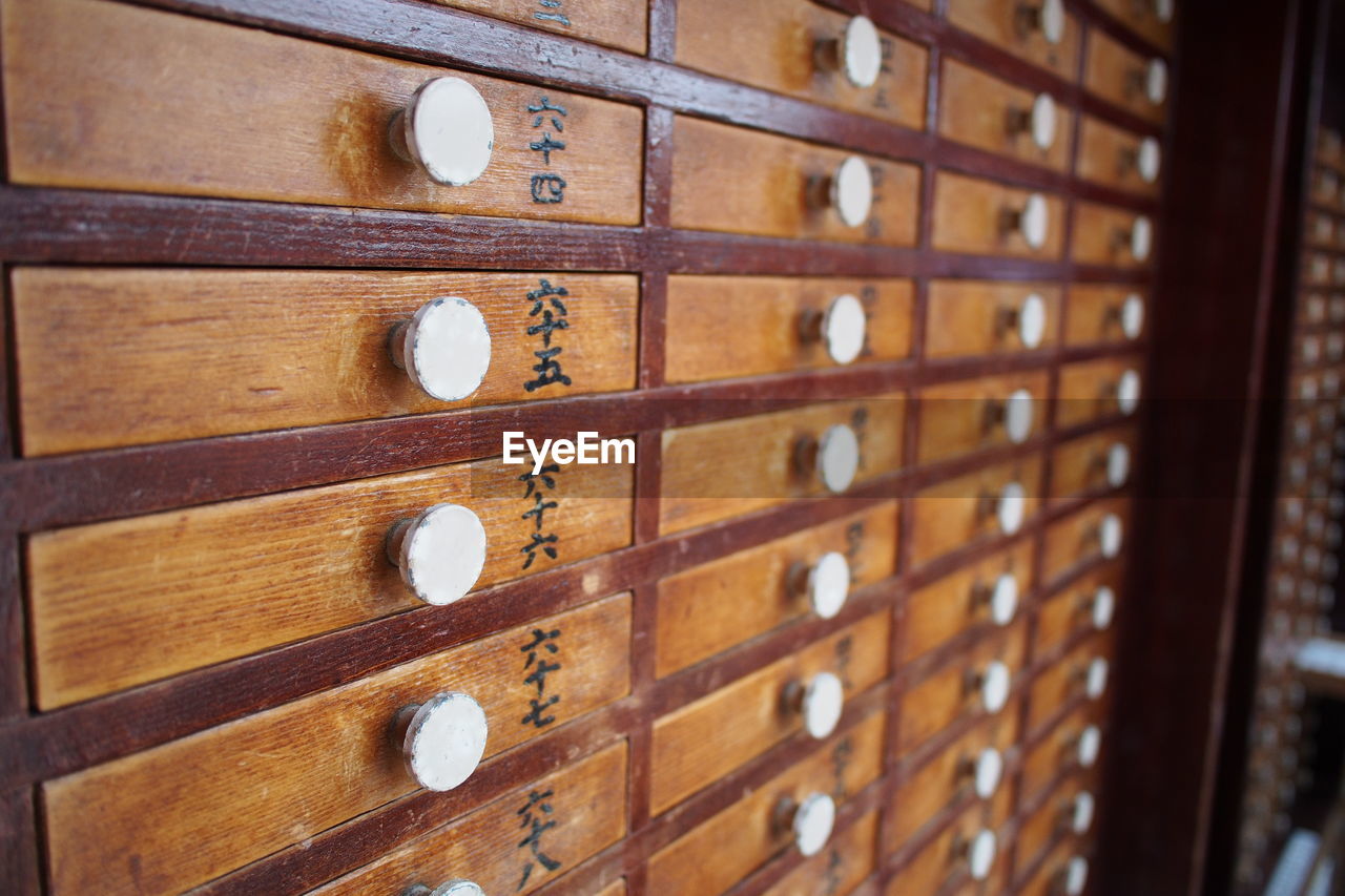 Close-up of wooden drawers