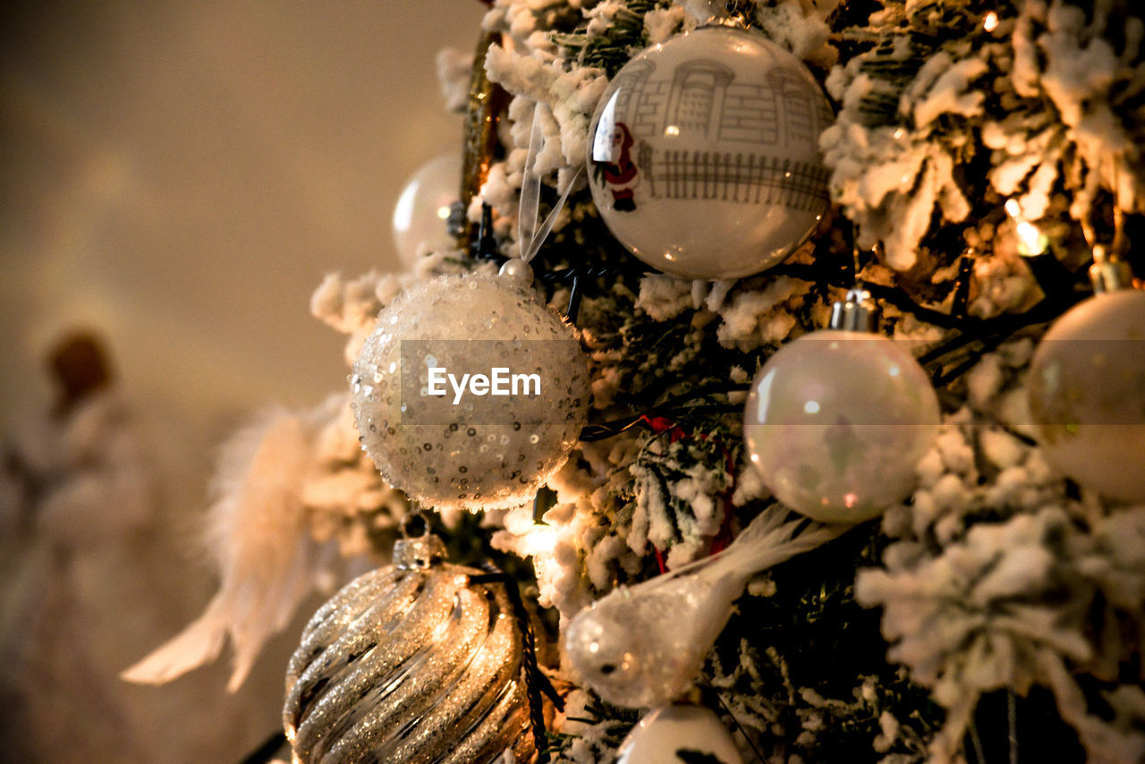 Close-up of christmas decoration hanging on tree
