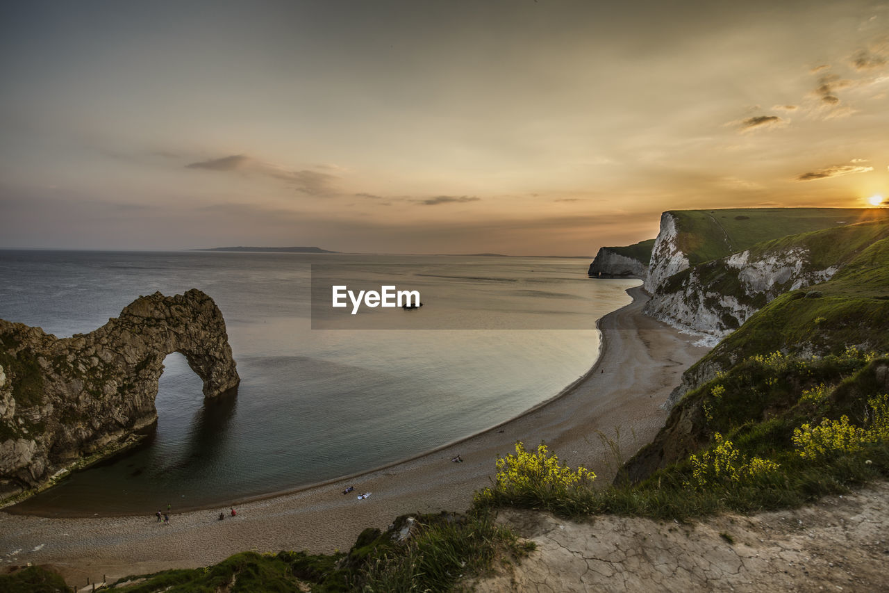 Scenic view of sea against sky during sunset