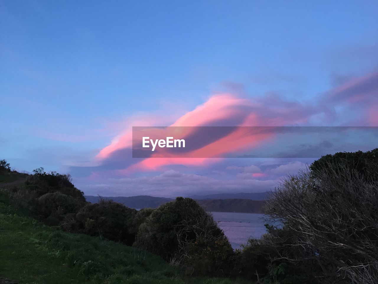 SCENIC VIEW OF SEA DURING SUNSET