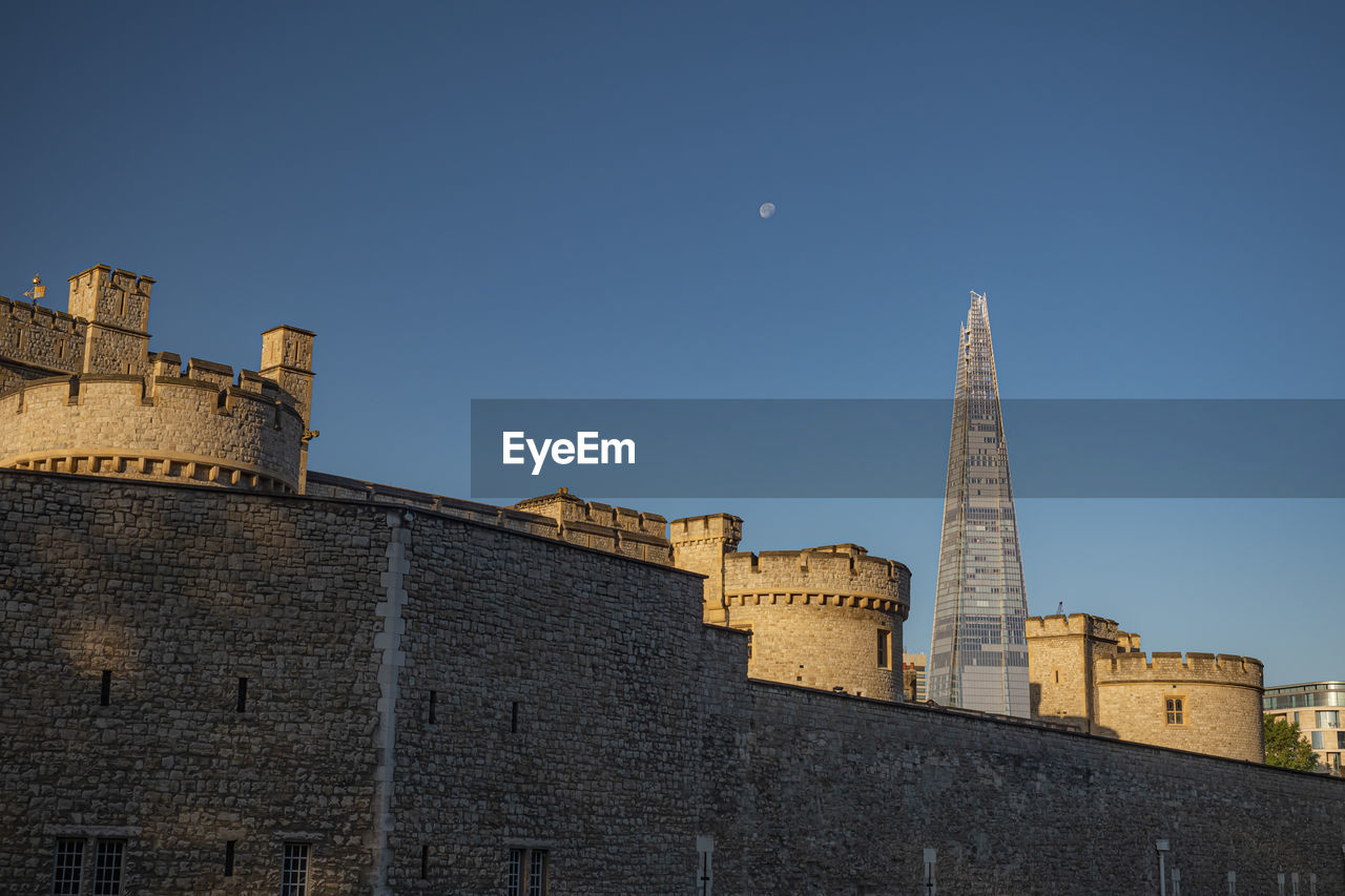 Centuries of history in one picture. the tower of london and the shard