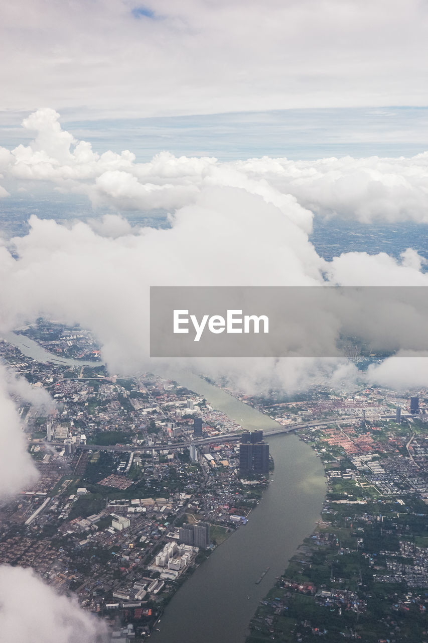 Aerial view of cityscape against sky