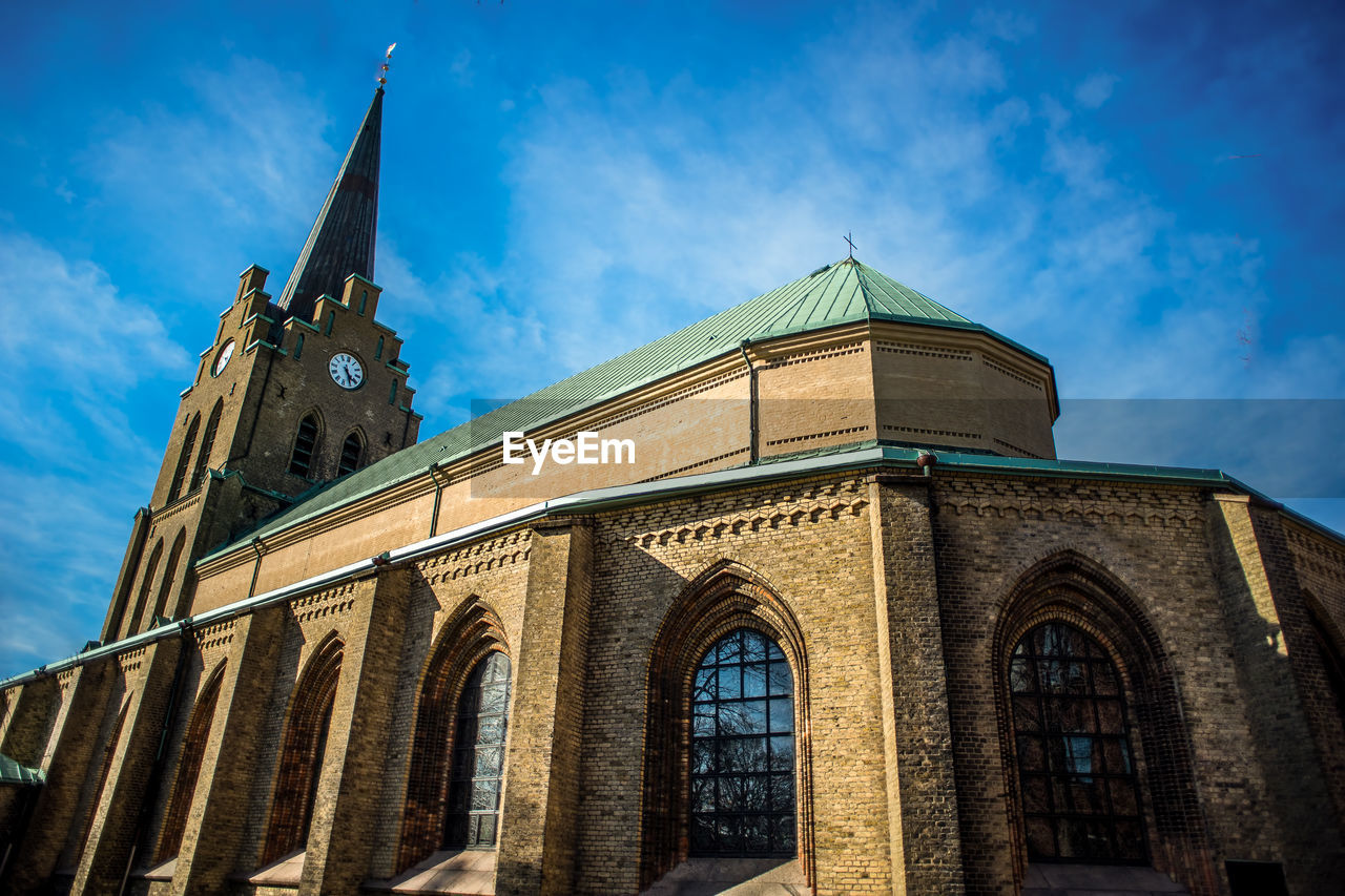 Low angle view of cathedral against blue sky