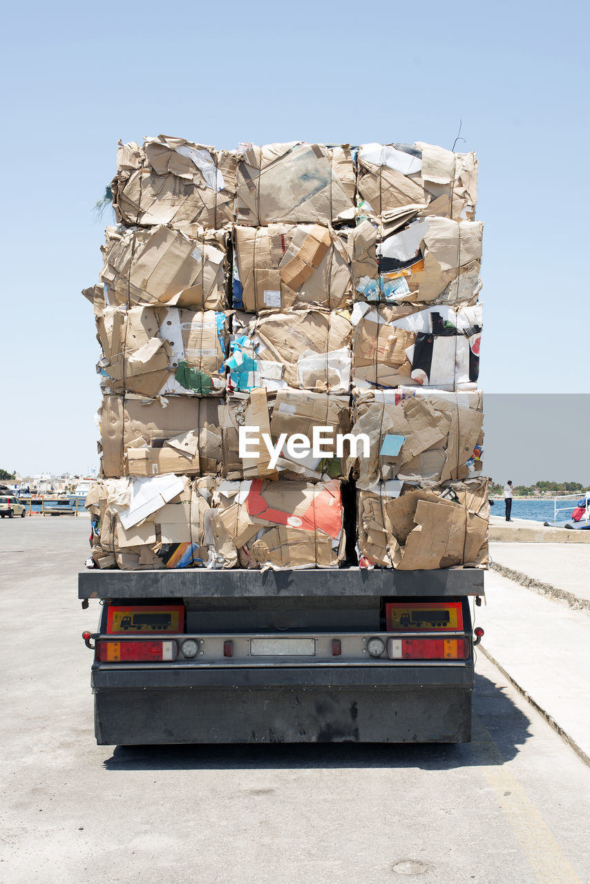 A view of a truck with recycled papers and cardboards in the customs of kos, greece