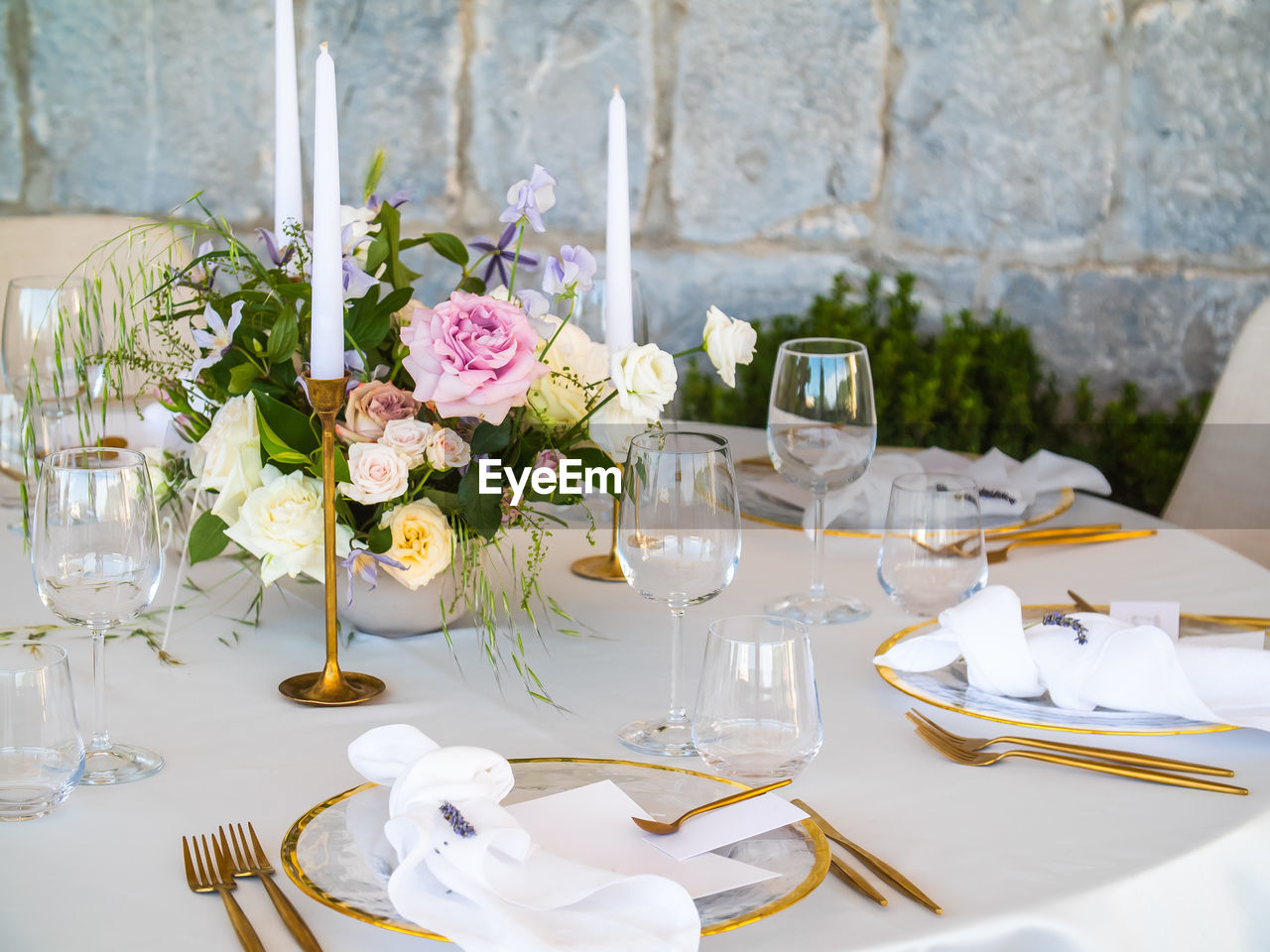 place setting on table against wall