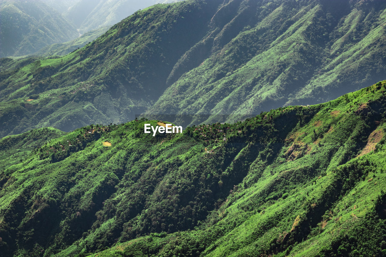 Misty mountain range covered with white mist