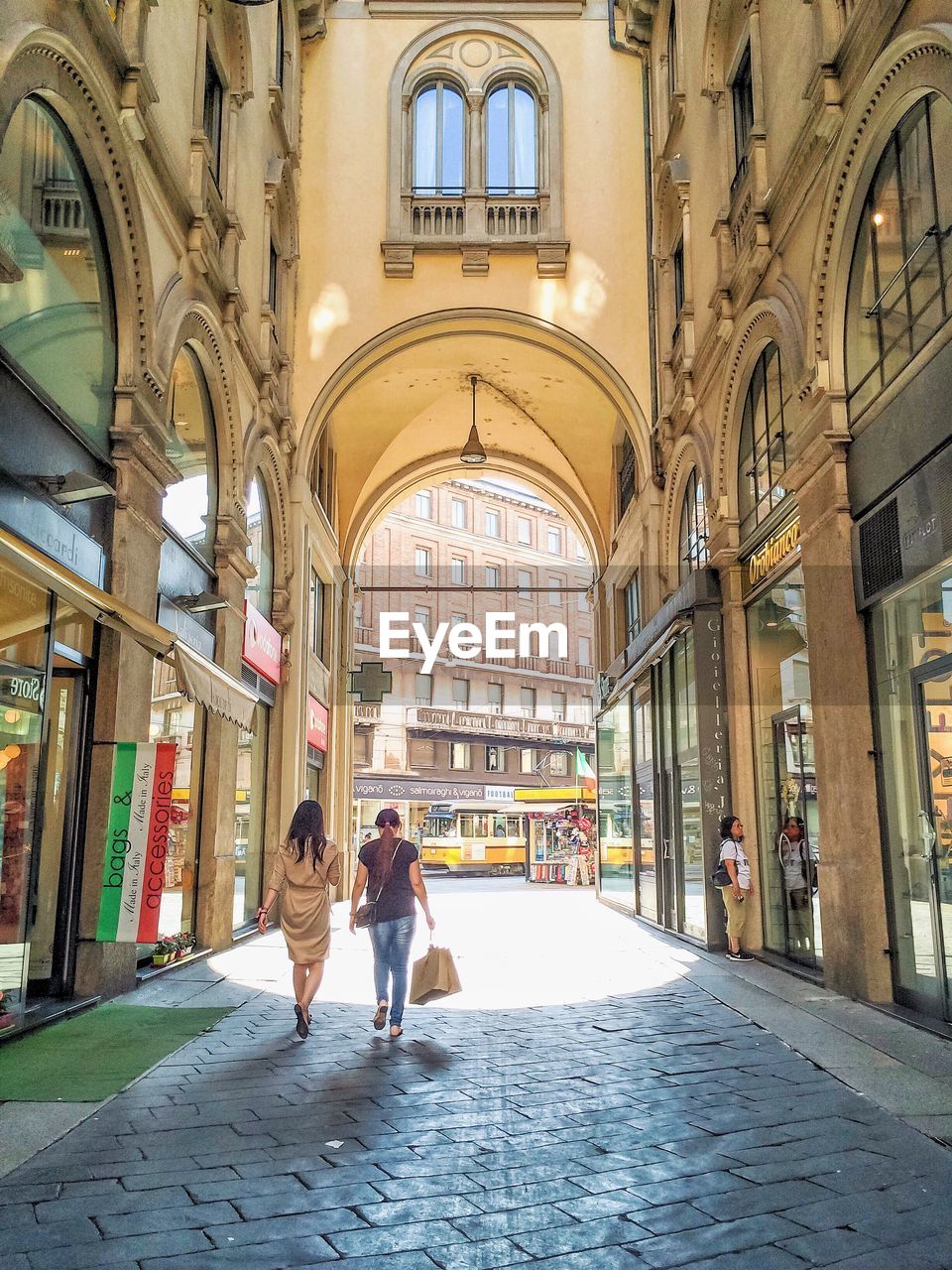 WOMAN WALKING IN CITY