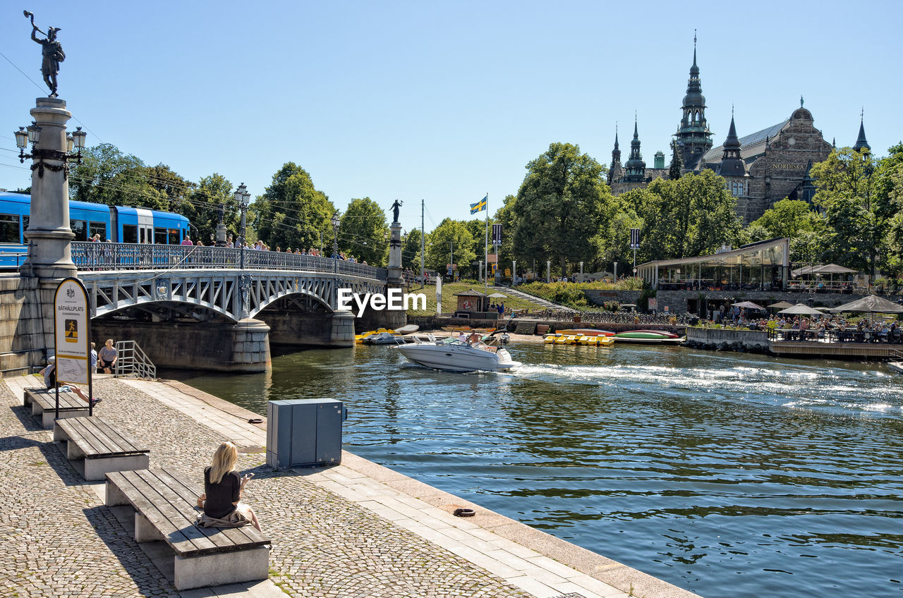 Bridge over river against clear sky