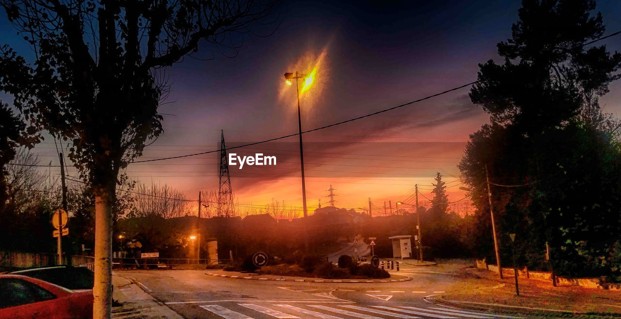 VIEW OF ROAD AT SUNSET