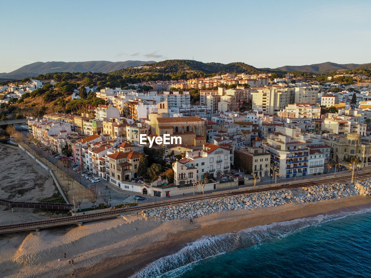 Aerial view of sant pol de mar village and its church ermita de sant jaume in el maresme coast.