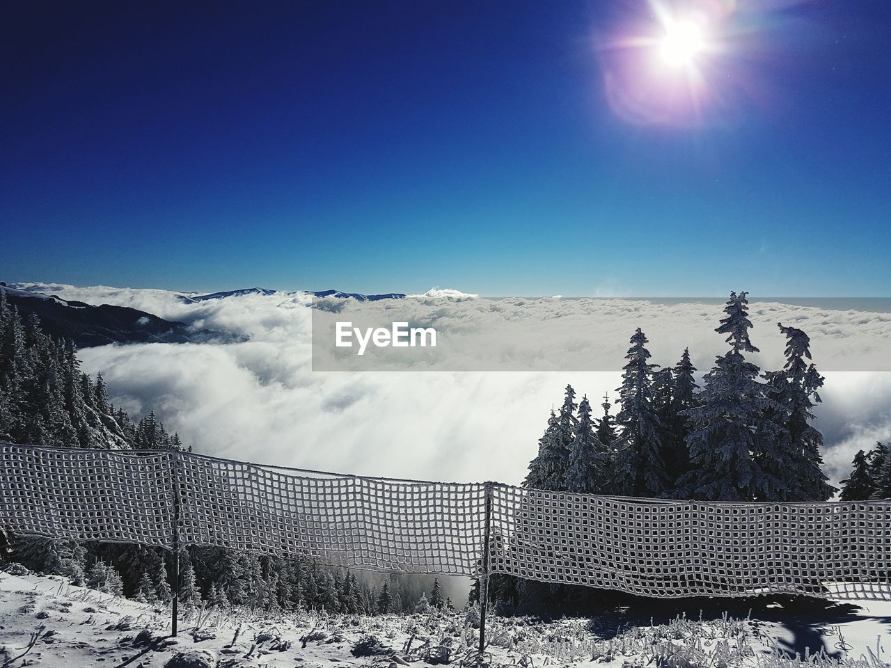 LOW ANGLE VIEW OF SNOW AGAINST SKY