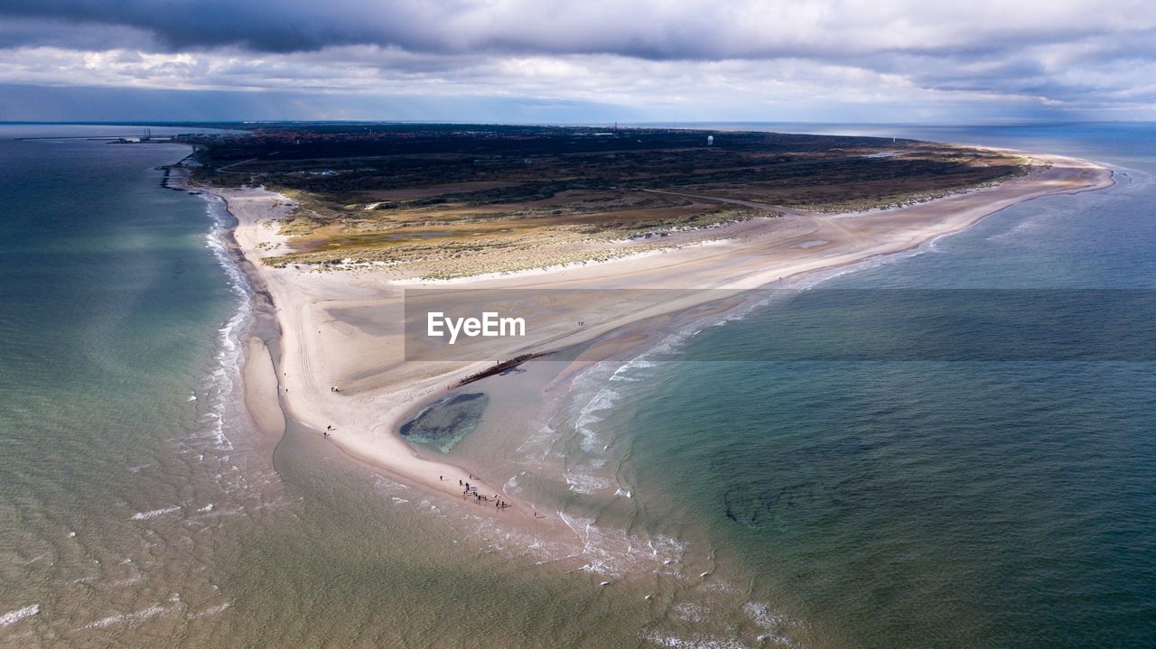 PANORAMIC SHOT OF BEACH AGAINST SKY