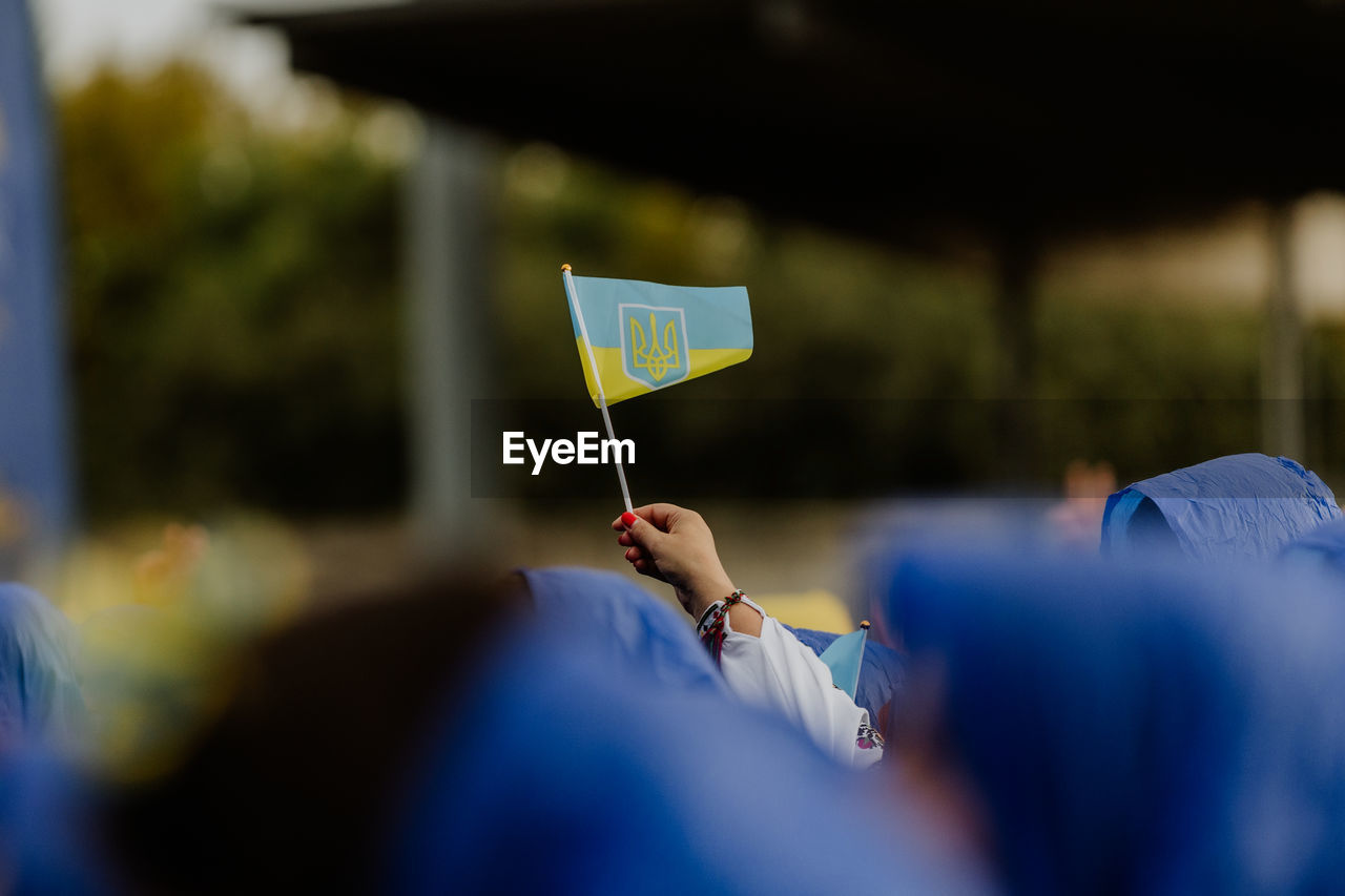 Woman holding ukrainian flag