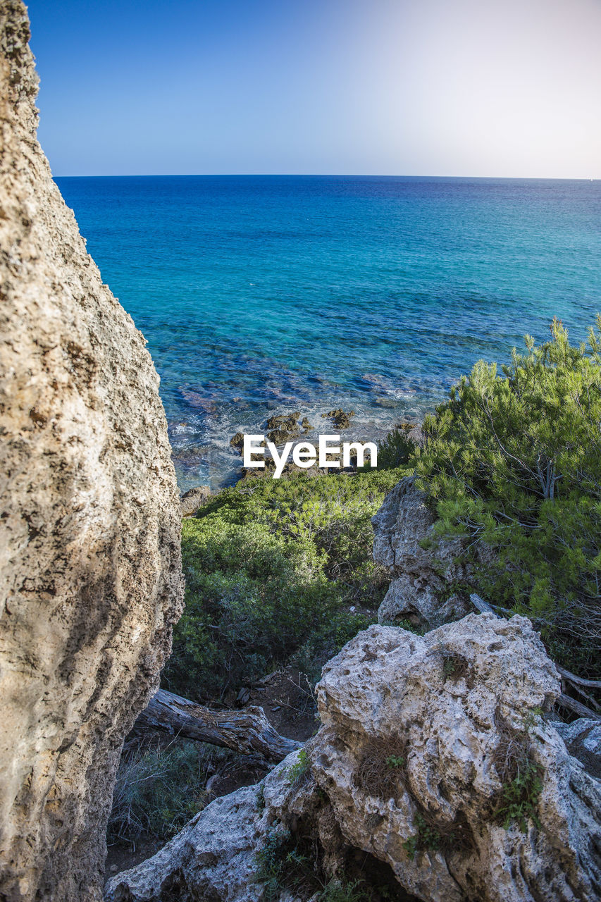 Scenic view of sea against clear sky