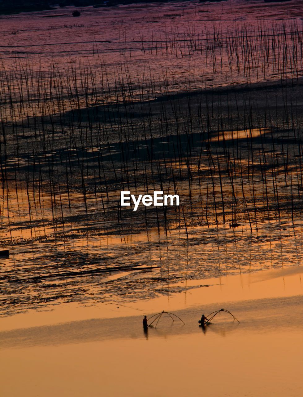 SCENIC VIEW OF LAKE DURING SUNSET