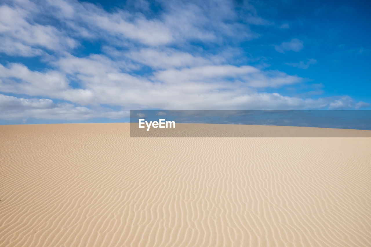 Scenic view of desert against sky