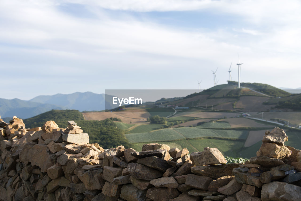 SCENIC VIEW OF MOUNTAINS BY SKY