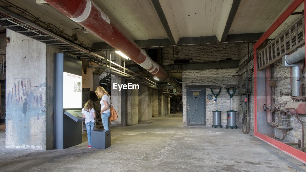 Mother and daughter visiting museum 