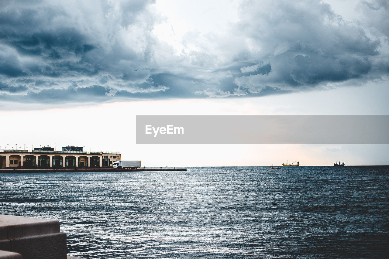 SHIP IN SEA AGAINST SKY